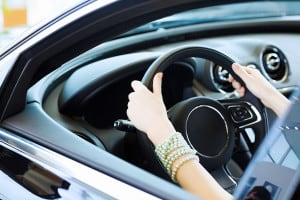 bigstock-Close-up-of-woman-hands-drivin-50089532