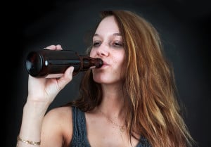 bigstock-Drunk-Woman-Drinking-Beer-Over-45072763