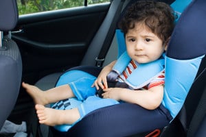 bigstock-toddler-boy-sitting-in-car-sea-14761151
